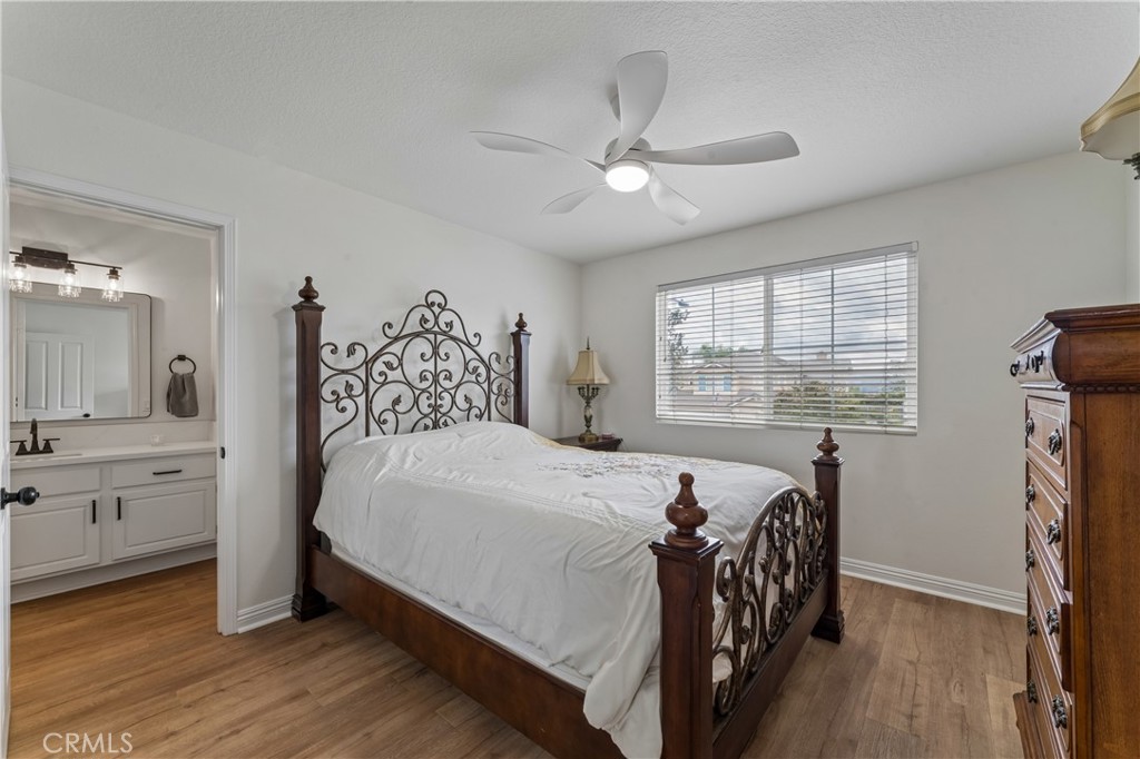 26023 Salinger Lane Stevenson Ranch, CA 91381 - Photo 18 of 35 Large upstairs bedroom featuring ample natural light and spacious layout.