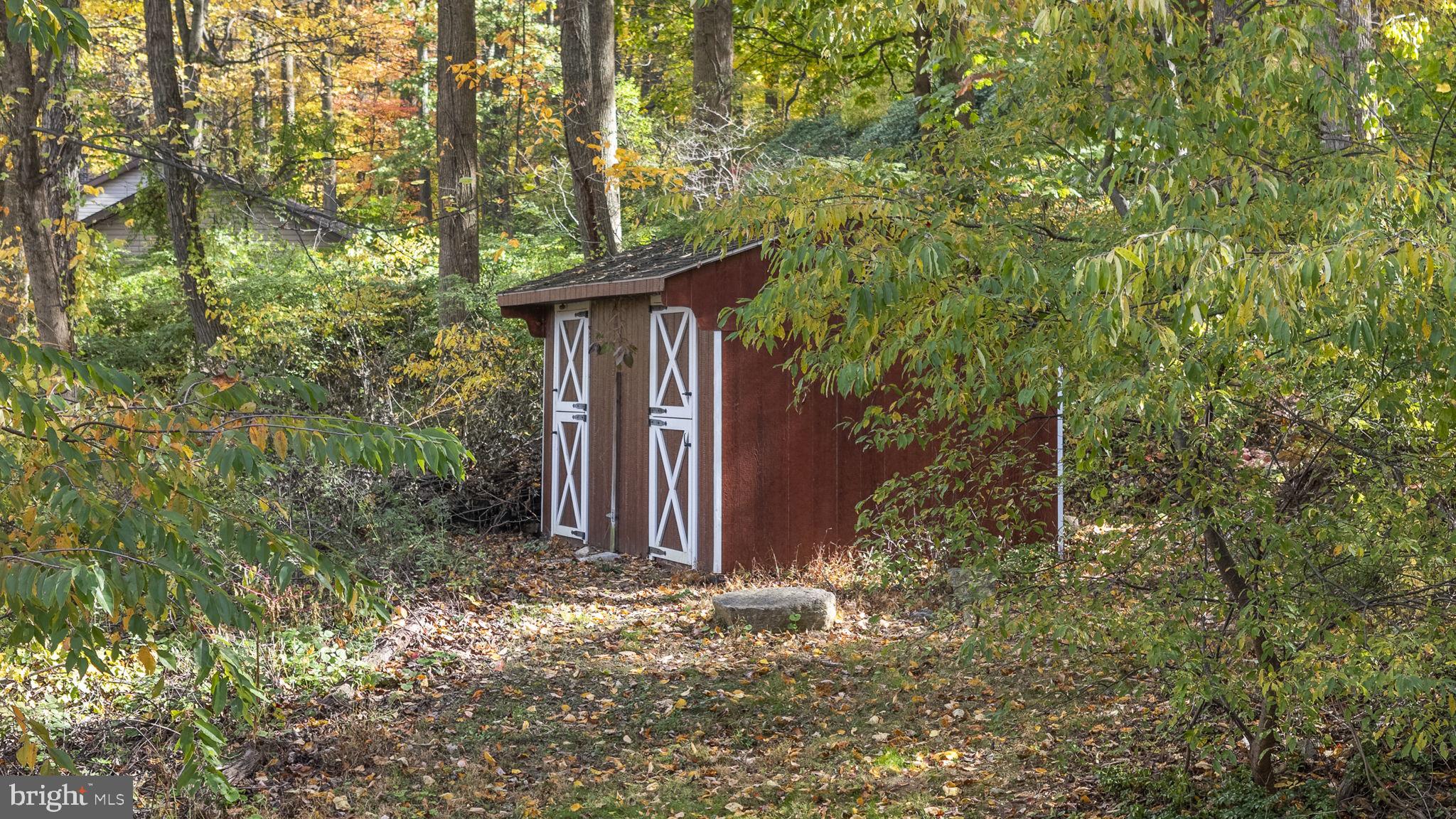 10 Woods Road Elverson, PA 19520 - Photo 11 of 49 a house with lots of trees