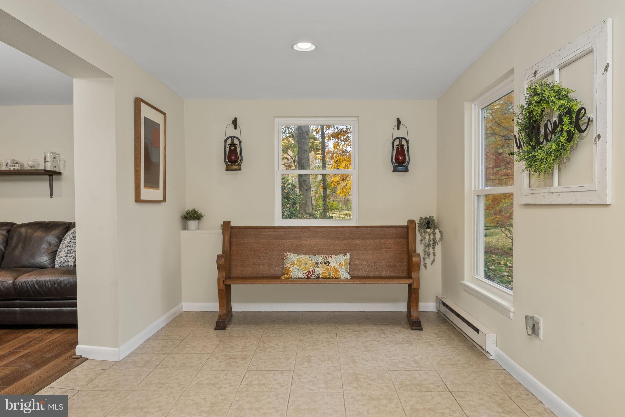 10 Woods Road Elverson, PA 19520 - Photo 16 of 49 a living room with furniture and a window