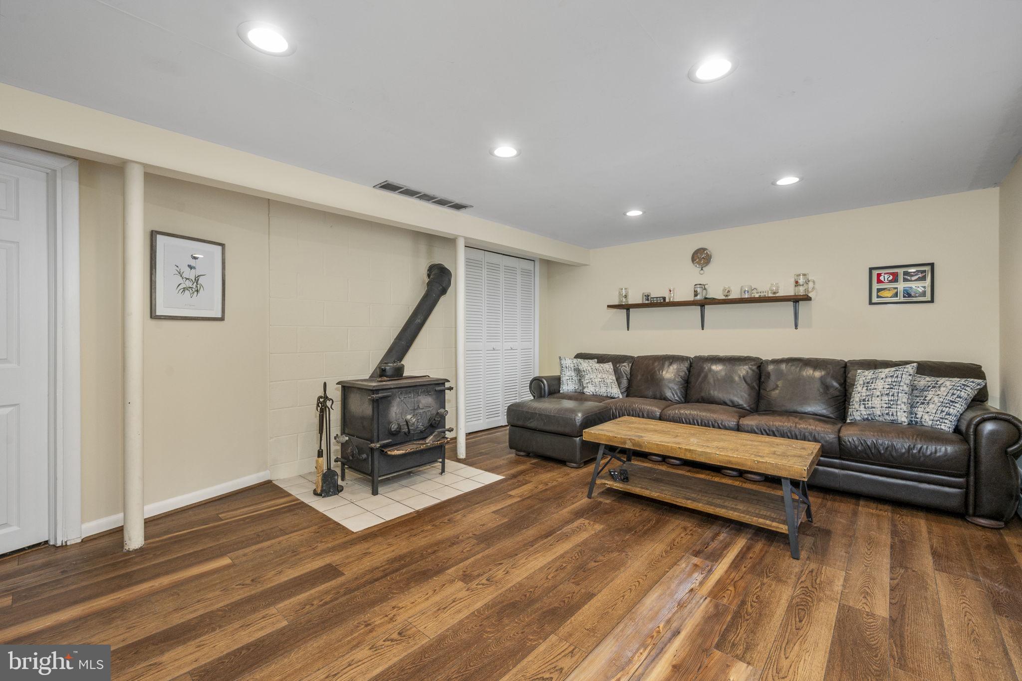 10 Woods Road Elverson, PA 19520 - Photo 17 of 49 a living room with furniture and a rug