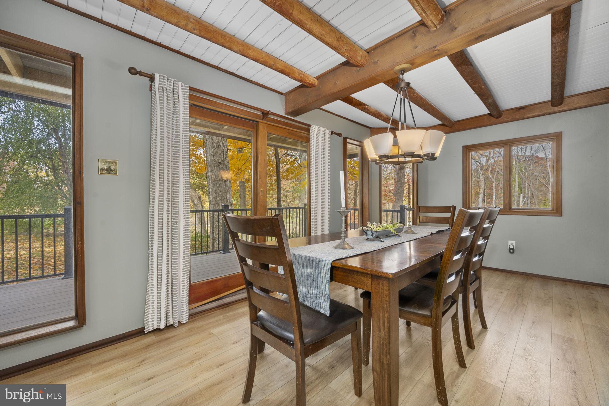 10 Woods Road Elverson, PA 19520 - Photo 31 of 49 a view of a dining room with furniture and wooden floor