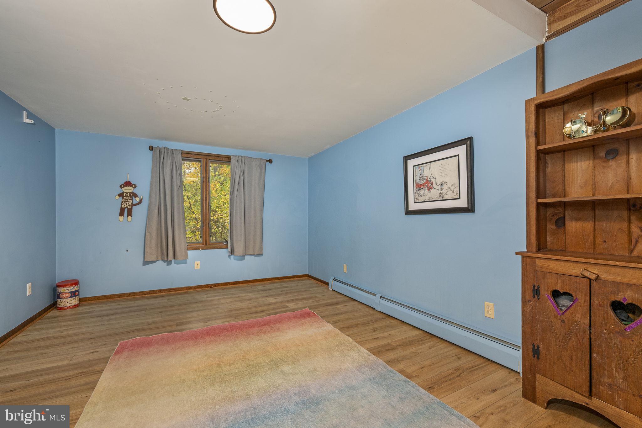 10 Woods Road Elverson, PA 19520 - Photo 38 of 49 a view of an empty room with a window