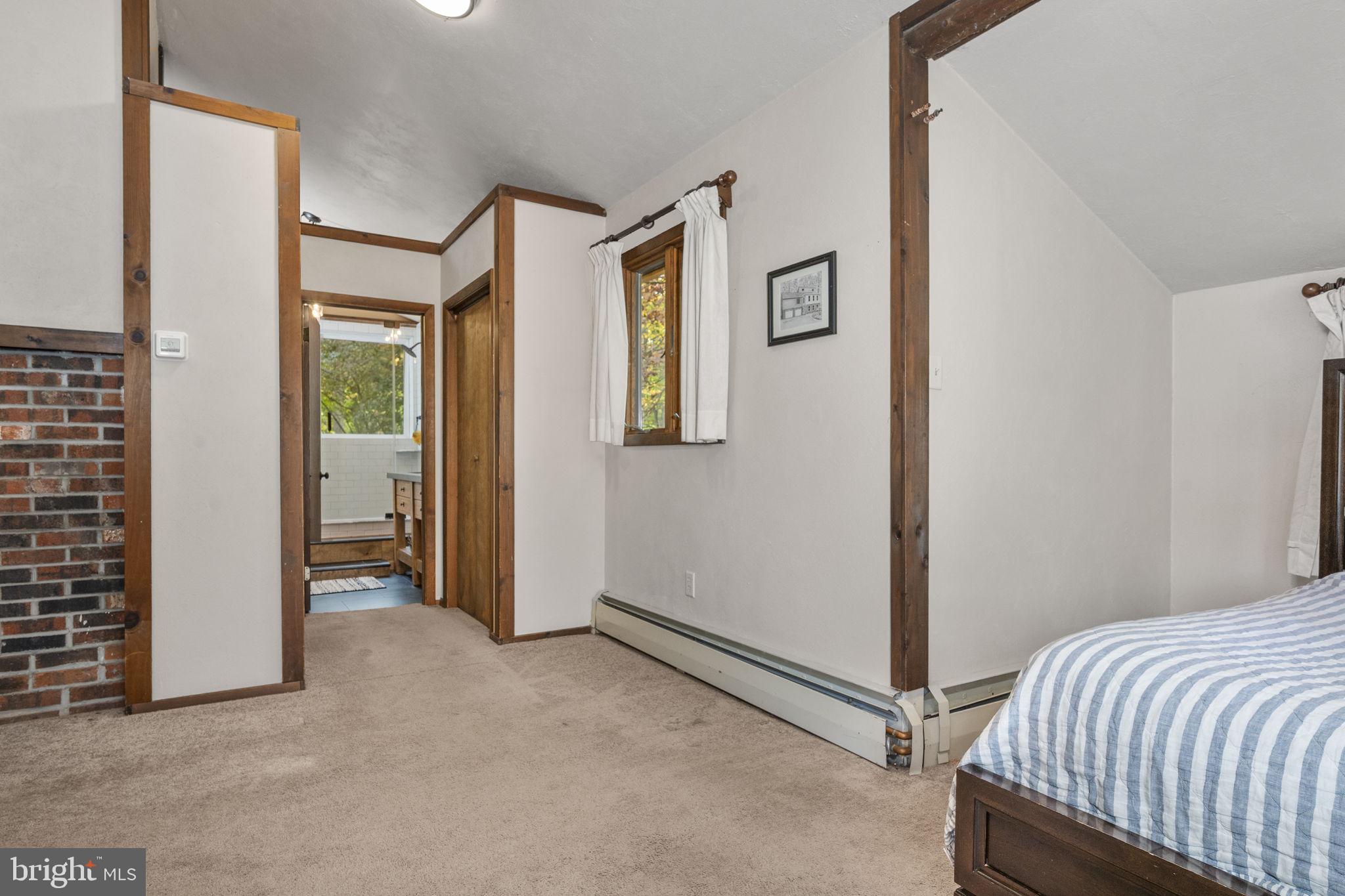 10 Woods Road Elverson, PA 19520 - Photo 44 of 49 a bedroom with bed and a window