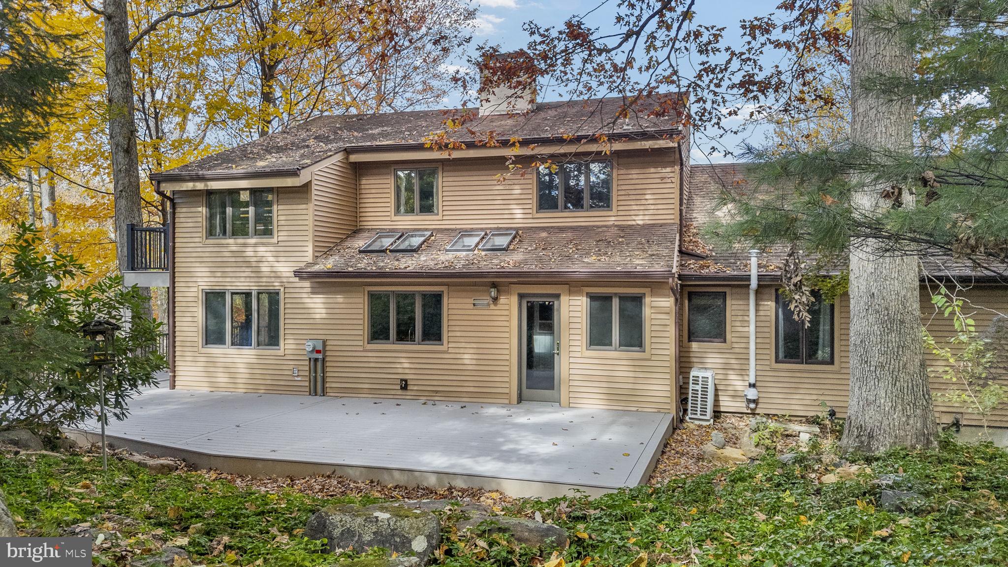 10 Woods Road Elverson, PA 19520 - Photo 5 of 49 front view of a house with a yard