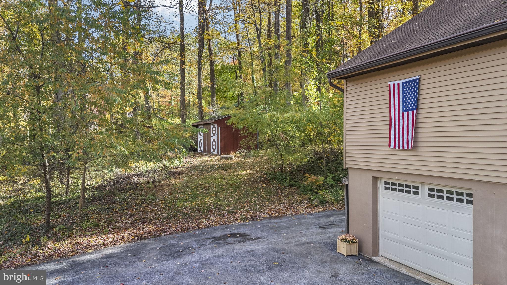 10 Woods Road Elverson, PA 19520 - Photo 10 of 49 a backyard of a house with lots of green space