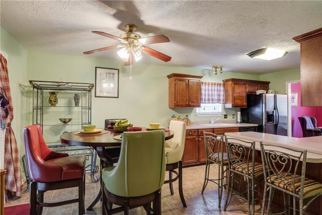 2525 Johnson Ridge Road Antioch, TN 37013 - Photo 7 of 16 Another view of breakfast area, kitchen and bar area.