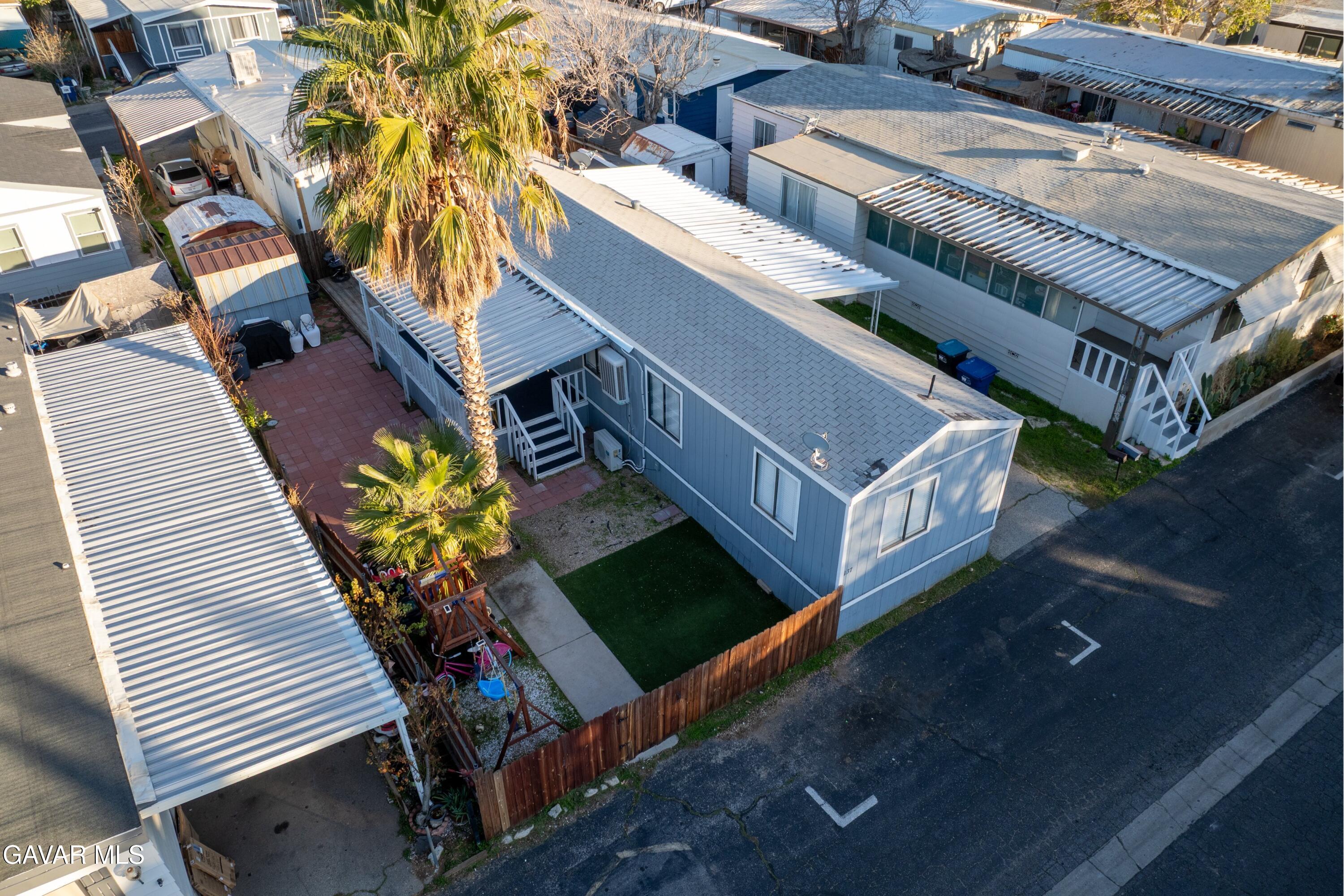 5711 Columbia Way Lancaster, CA 93536 - Photo 15 of 21 an aerial view of a house with a yard and staircase