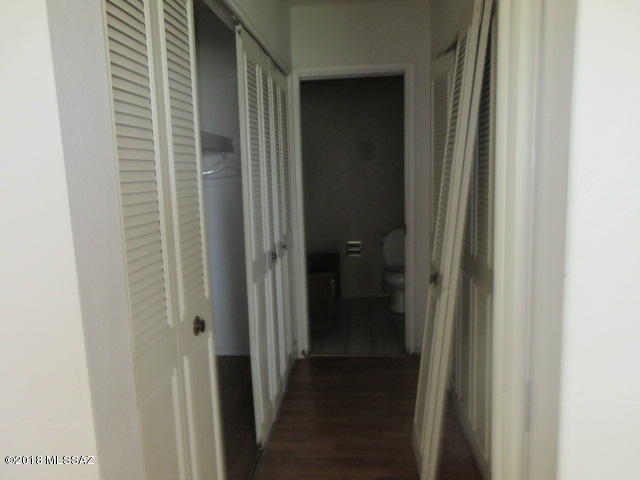 403 Curry Street Rio Rico, AZ 85648 - Photo 17 of 23 a view of a bathroom from a hallway