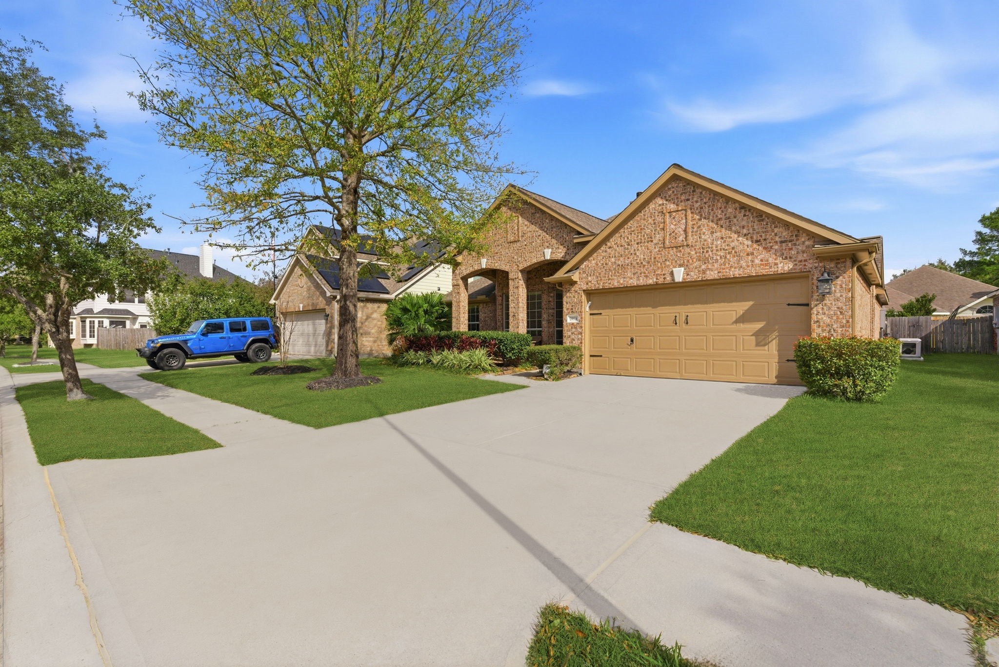 29814 Legends Pass Lane Spring, TX 77386 - Photo 4 of 46 a front view of a house with a yard and garage