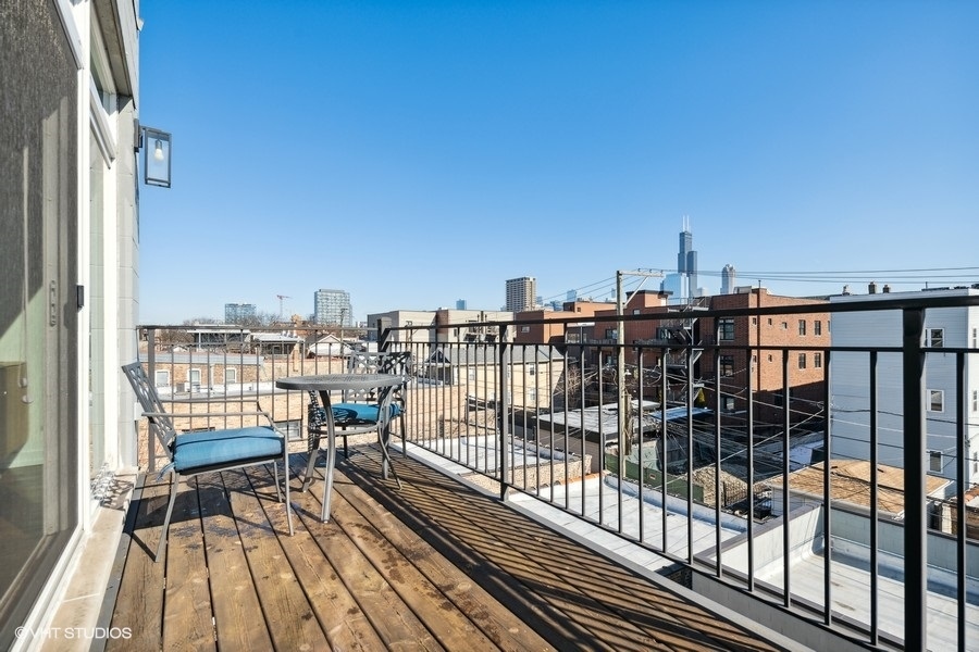 1033 South Racine Avenue, Unit 3NR Chicago, IL 60607 - Photo 22 of 34 a view of city from a balcony
