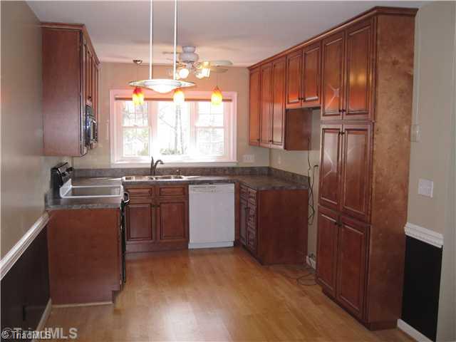 3220 Rockingham Road High Point, NC 27265 - Photo 3 of 16 Kitchen. Beautiful Cabinets with soft close drawers. Very high end renovation that is tastefully done.