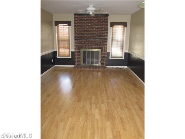 3220 Rockingham Road High Point, NC 27265 - Photo 9 of 16 Den/Family/Great Room. Cozy den where you can snuggle up to the gas logs in the fireplace with a great book. Open to kitchen & breakfast area so perfect space for entertaining indoors. Check out the pretty floors!