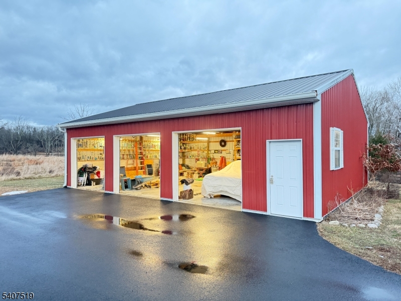 33 Hibler Road Newton, NJ 07860 - Photo 29 of 33 a view of empty room with wooden floor and fan