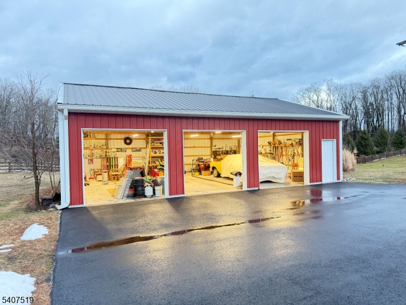 33 Hibler Road Newton, NJ 07860 - Photo 30 of 33 a view of an empty room with a fireplace and a large window