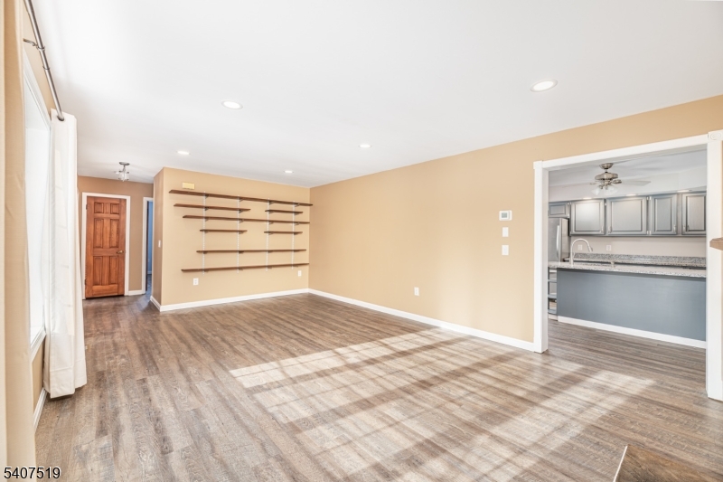 33 Hibler Road Newton, NJ 07860 - Photo 8 of 33 a view of a kitchen with a sink and a refrigerator