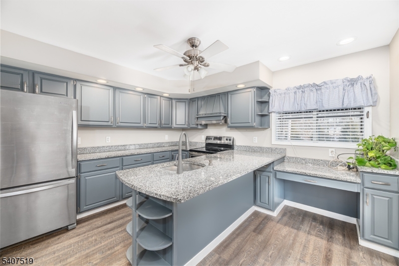 33 Hibler Road Newton, NJ 07860 - Photo 10 of 33 a kitchen with a refrigerator sink and cabinets
