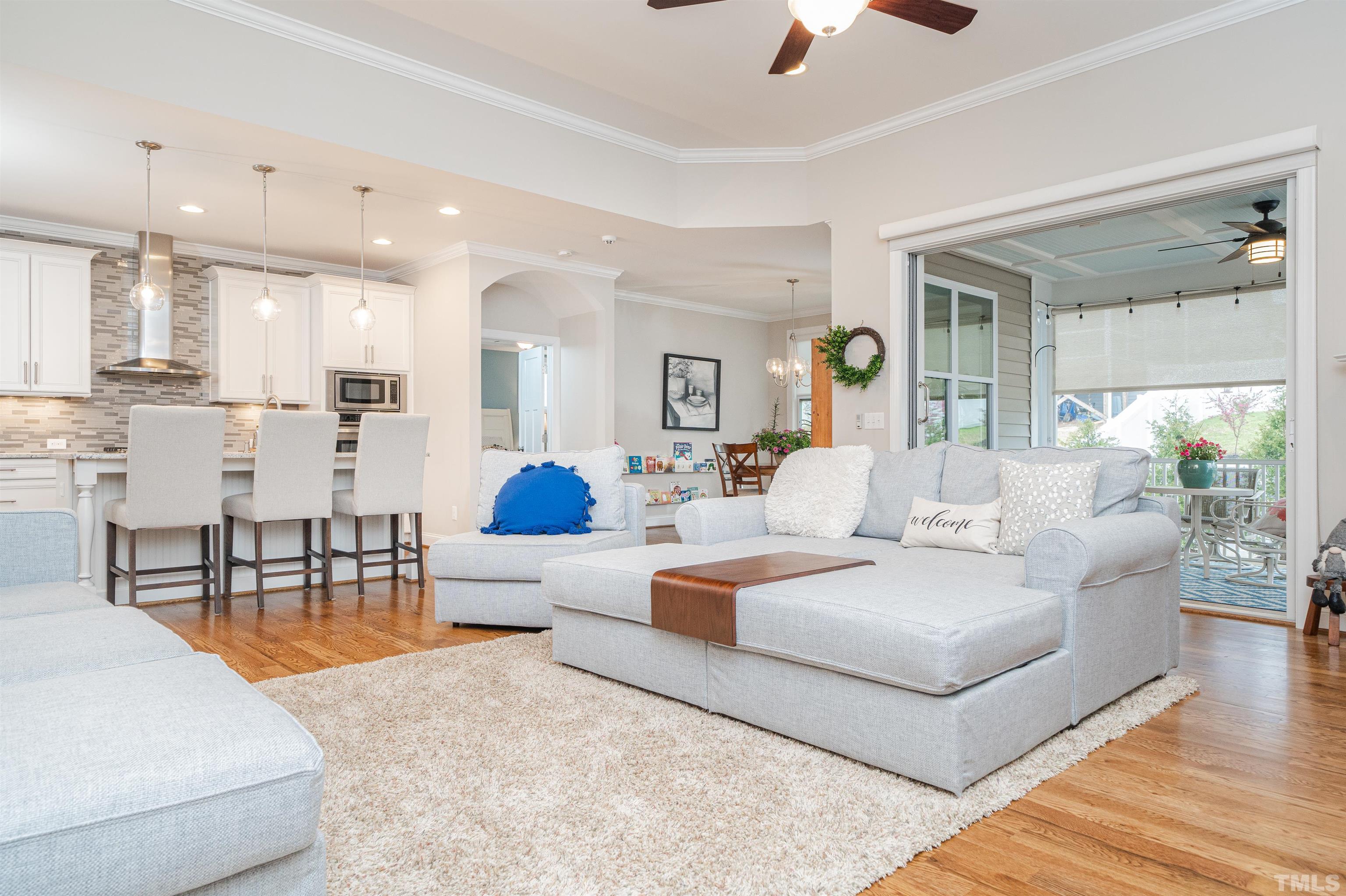 616 Connington Way Rolesville, NC 27571 - Photo 12 of 51 a living room with furniture and a chandelier