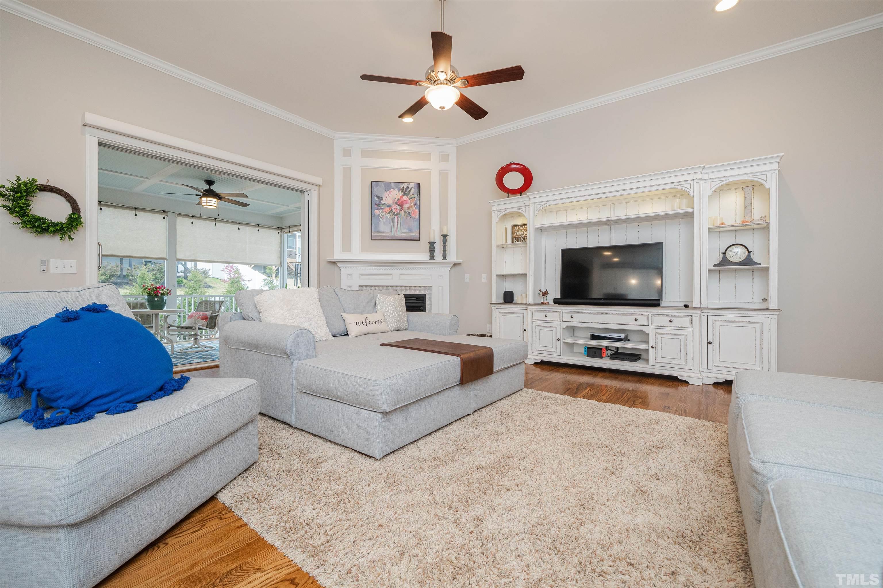 616 Connington Way Rolesville, NC 27571 - Photo 13 of 51 a living room with furniture and a flat screen tv