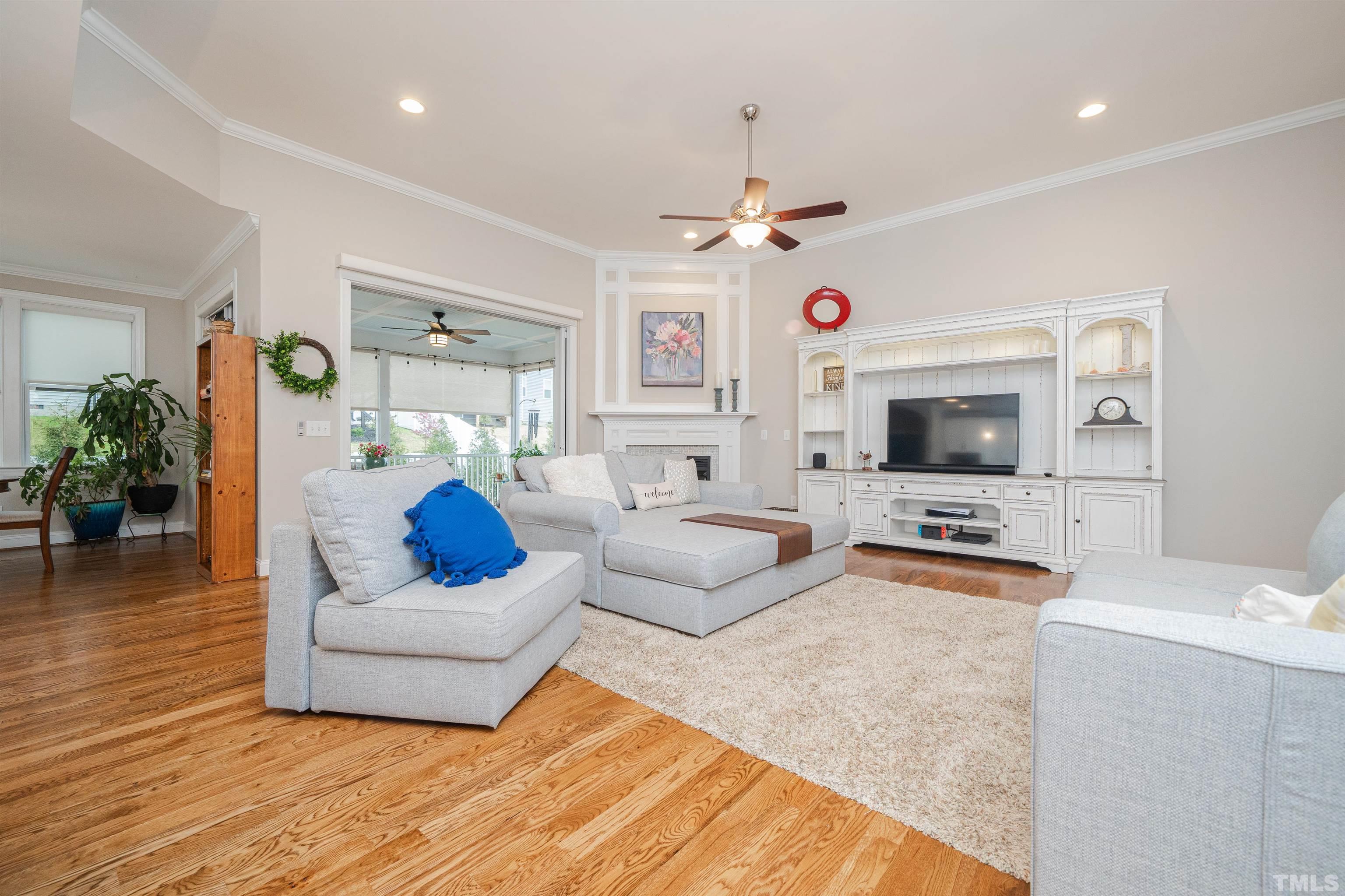 616 Connington Way Rolesville, NC 27571 - Photo 14 of 51 a living room with furniture and a flat screen tv