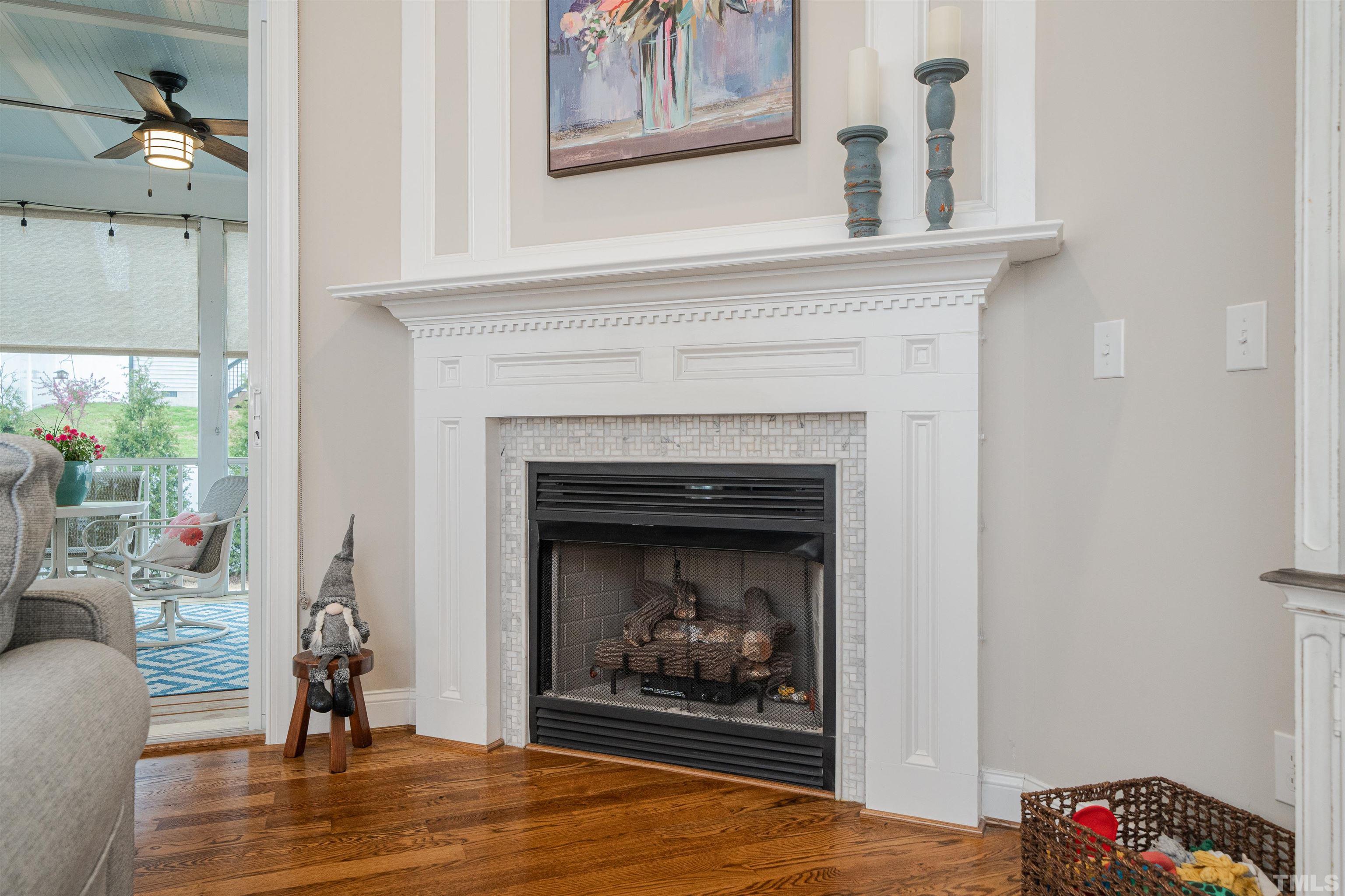 616 Connington Way Rolesville, NC 27571 - Photo 15 of 51 a living room with furniture and a fireplace