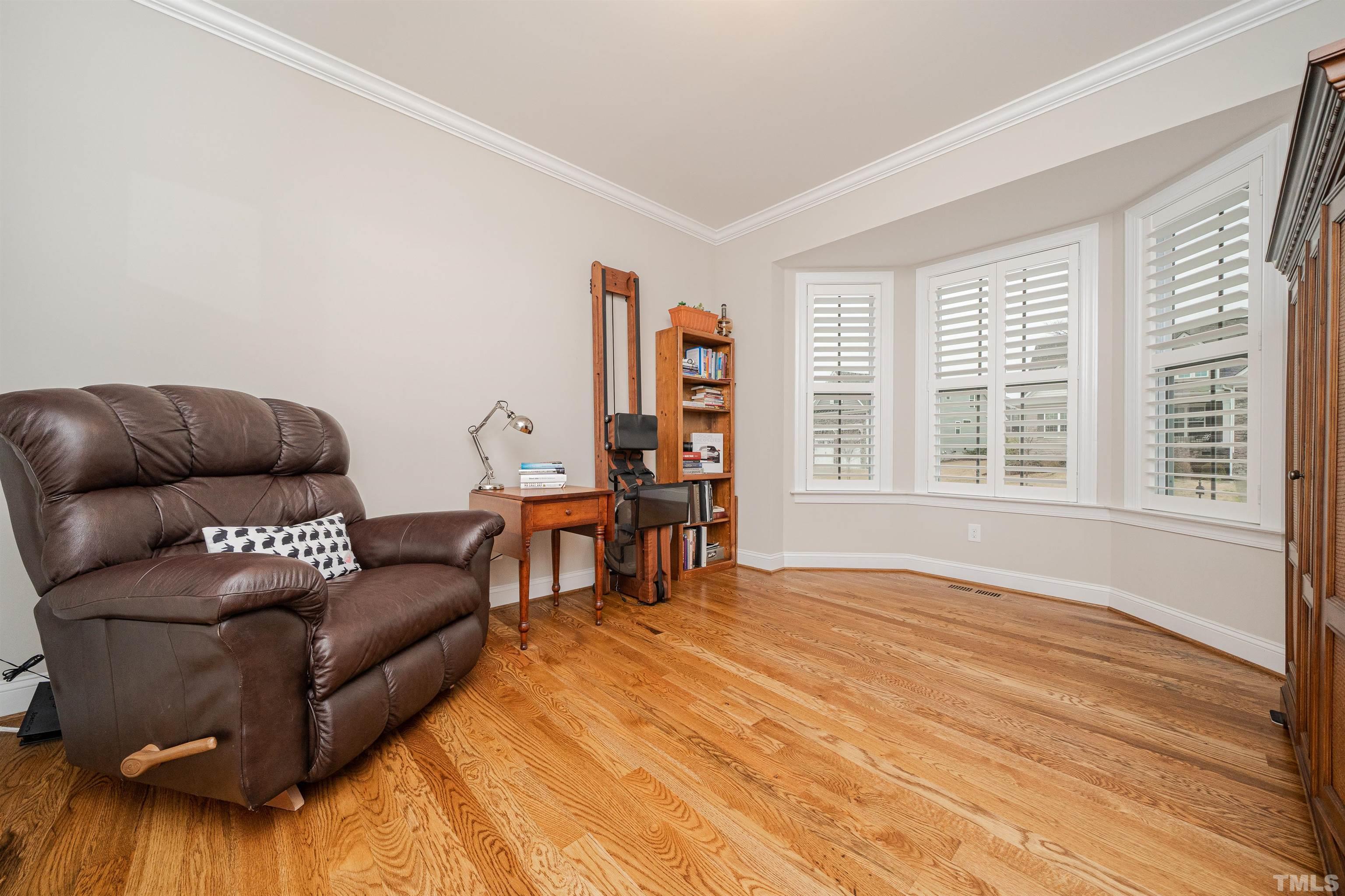616 Connington Way Rolesville, NC 27571 - Photo 29 of 51 a living room with furniture and a wooden floor