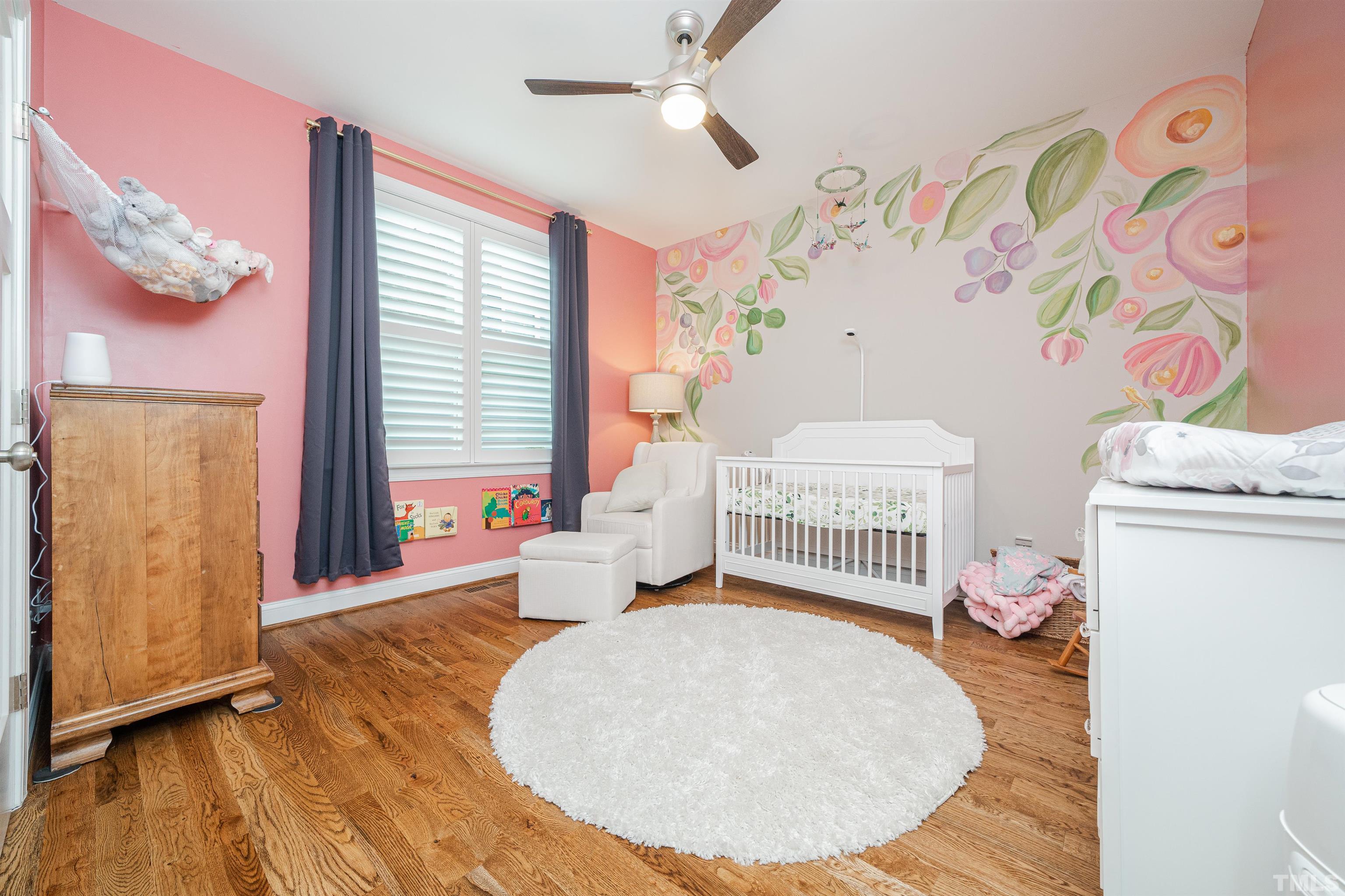 616 Connington Way Rolesville, NC 27571 - Photo 42 of 51 a bedroom with a bed and a window