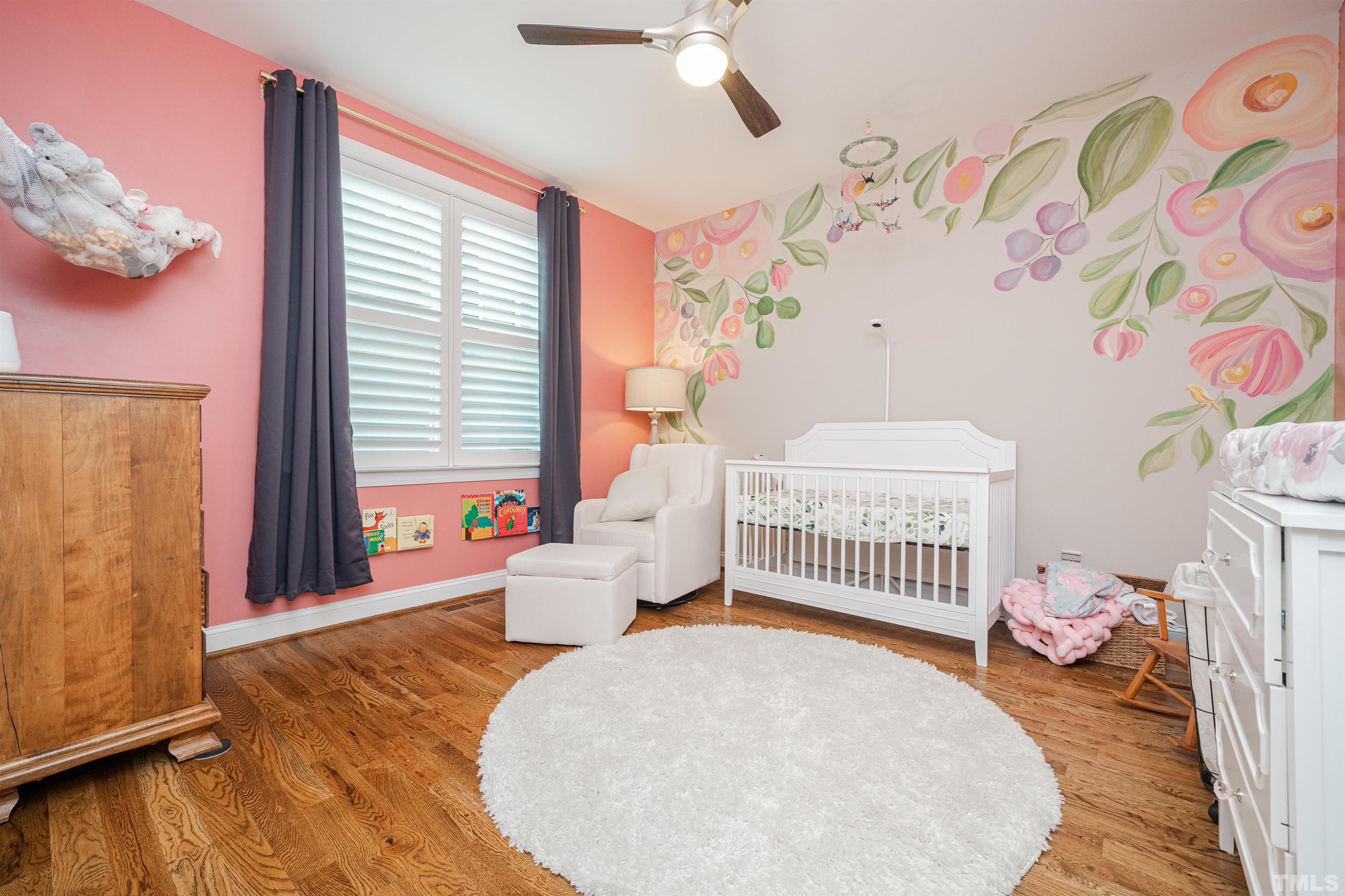 616 Connington Way Rolesville, NC 27571 - Photo 43 of 51 a spacious bedroom with a bed and a window