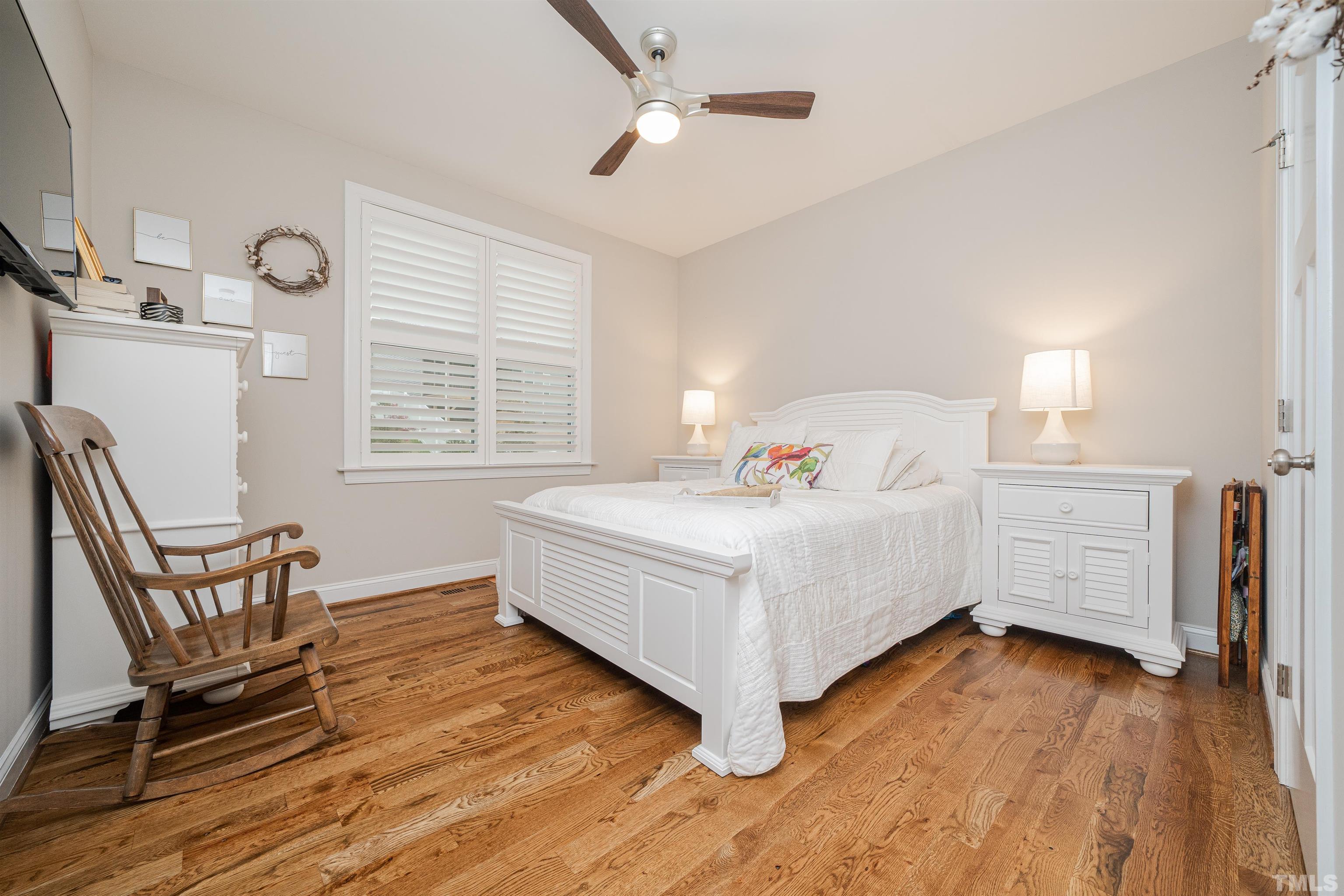 616 Connington Way Rolesville, NC 27571 - Photo 47 of 51 a white bed sitting in a bedroom next to a window