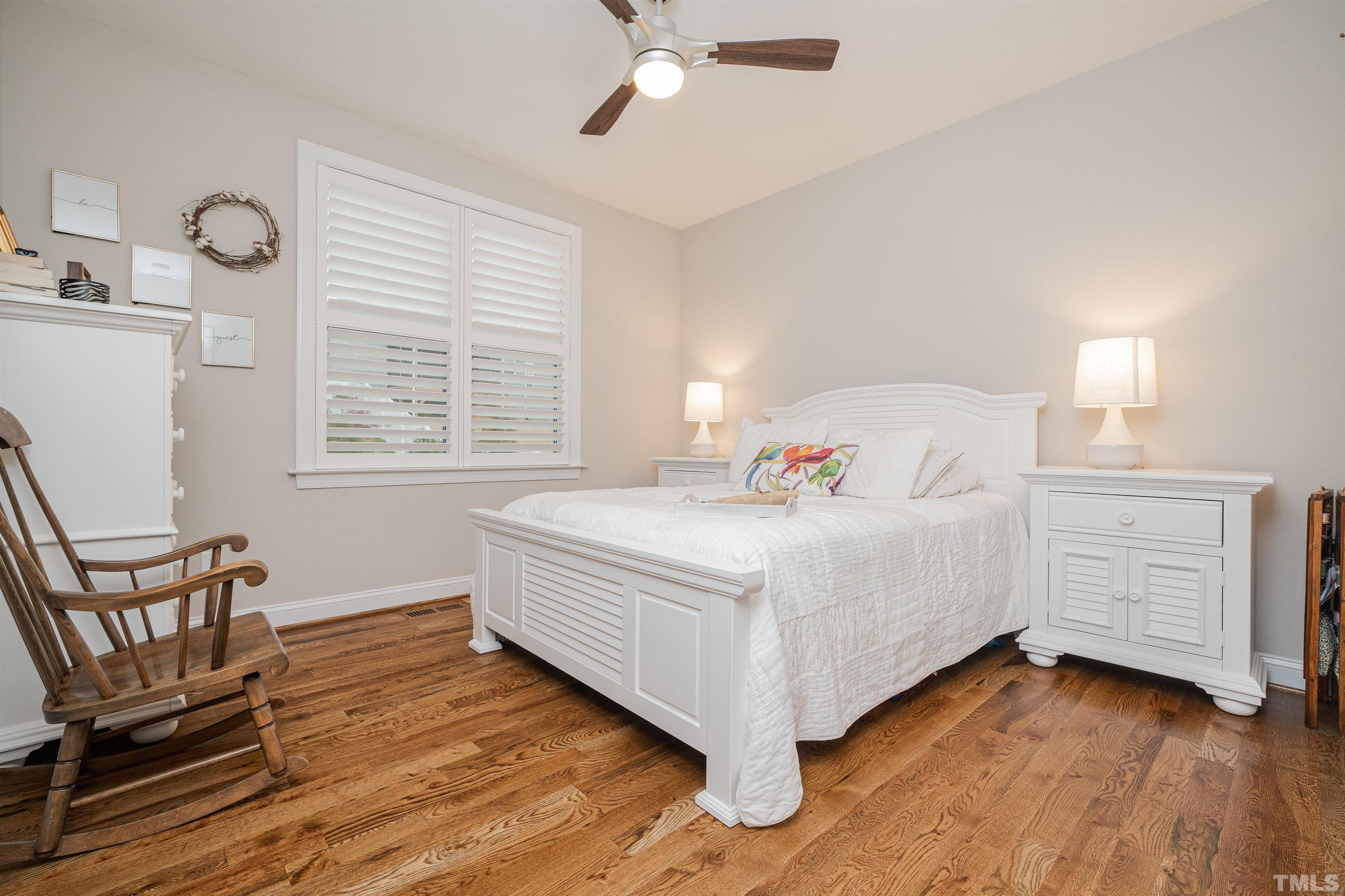 616 Connington Way Rolesville, NC 27571 - Photo 48 of 51 a white bed sitting in a bedroom next to a window