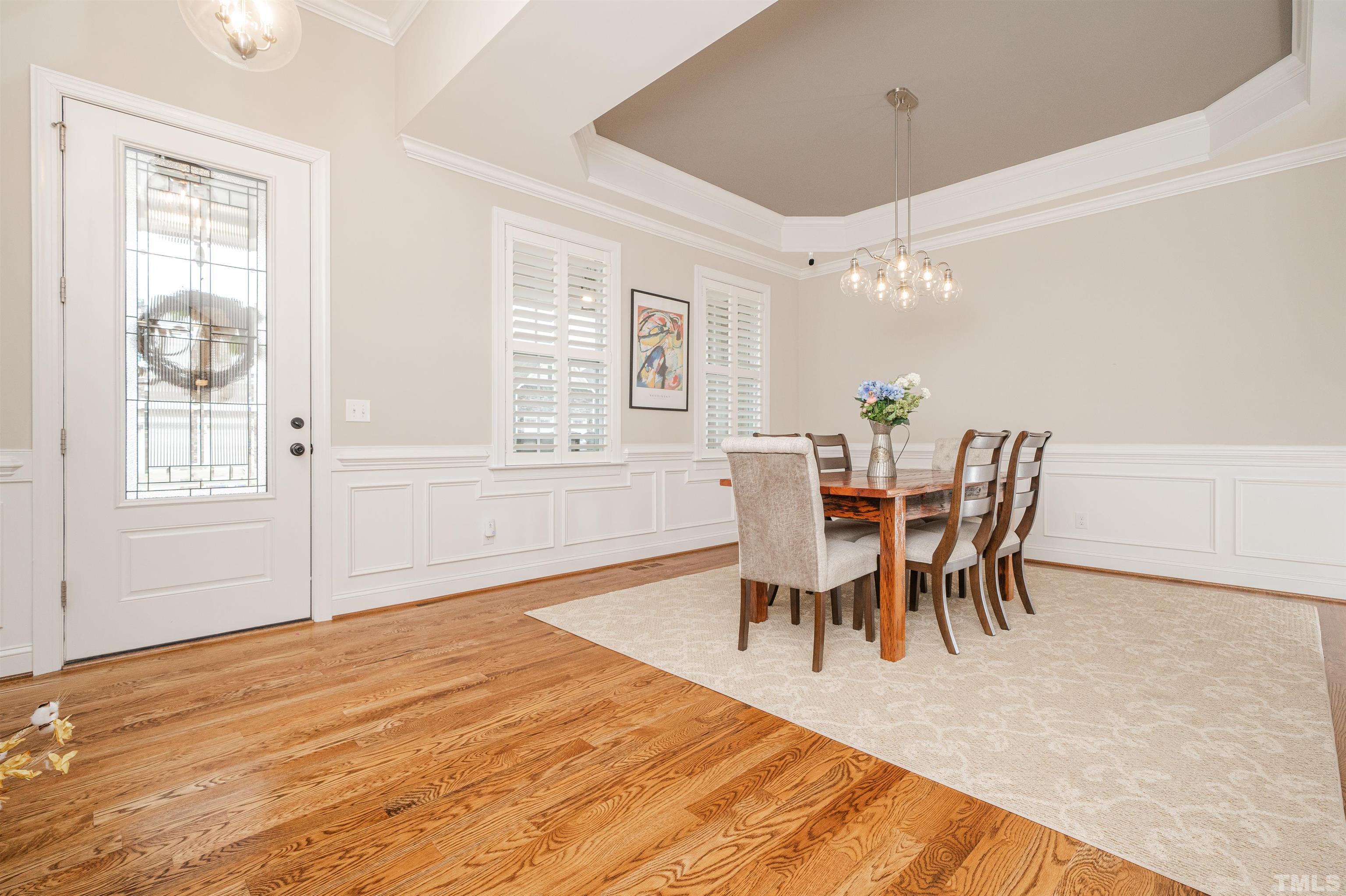 616 Connington Way Rolesville, NC 27571 - Photo 5 of 51 a dining room with wooden floor and breakfast area