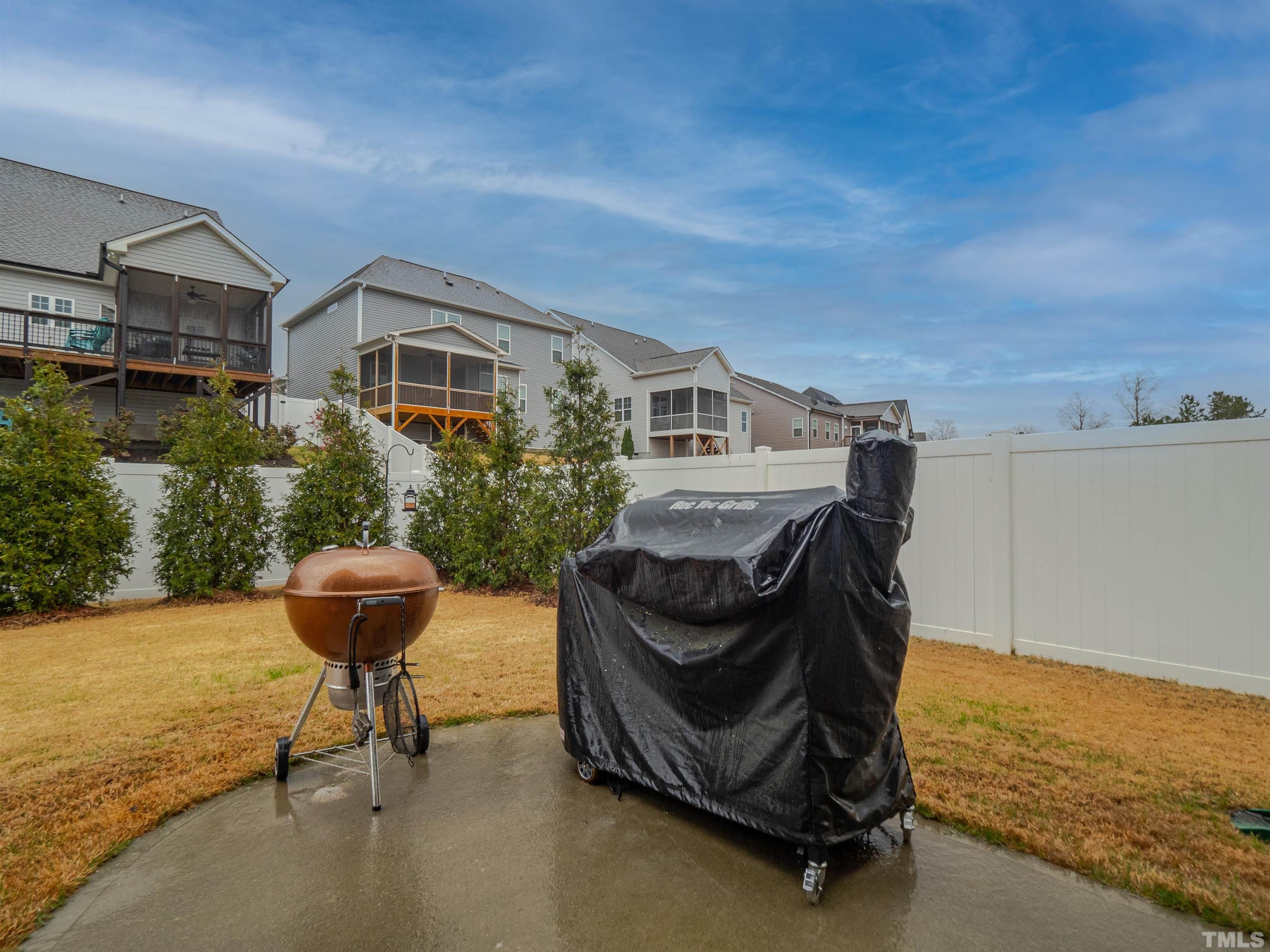 616 Connington Way Rolesville, NC 27571 - Photo 51 of 51 a view of a terrace with chairs and a table