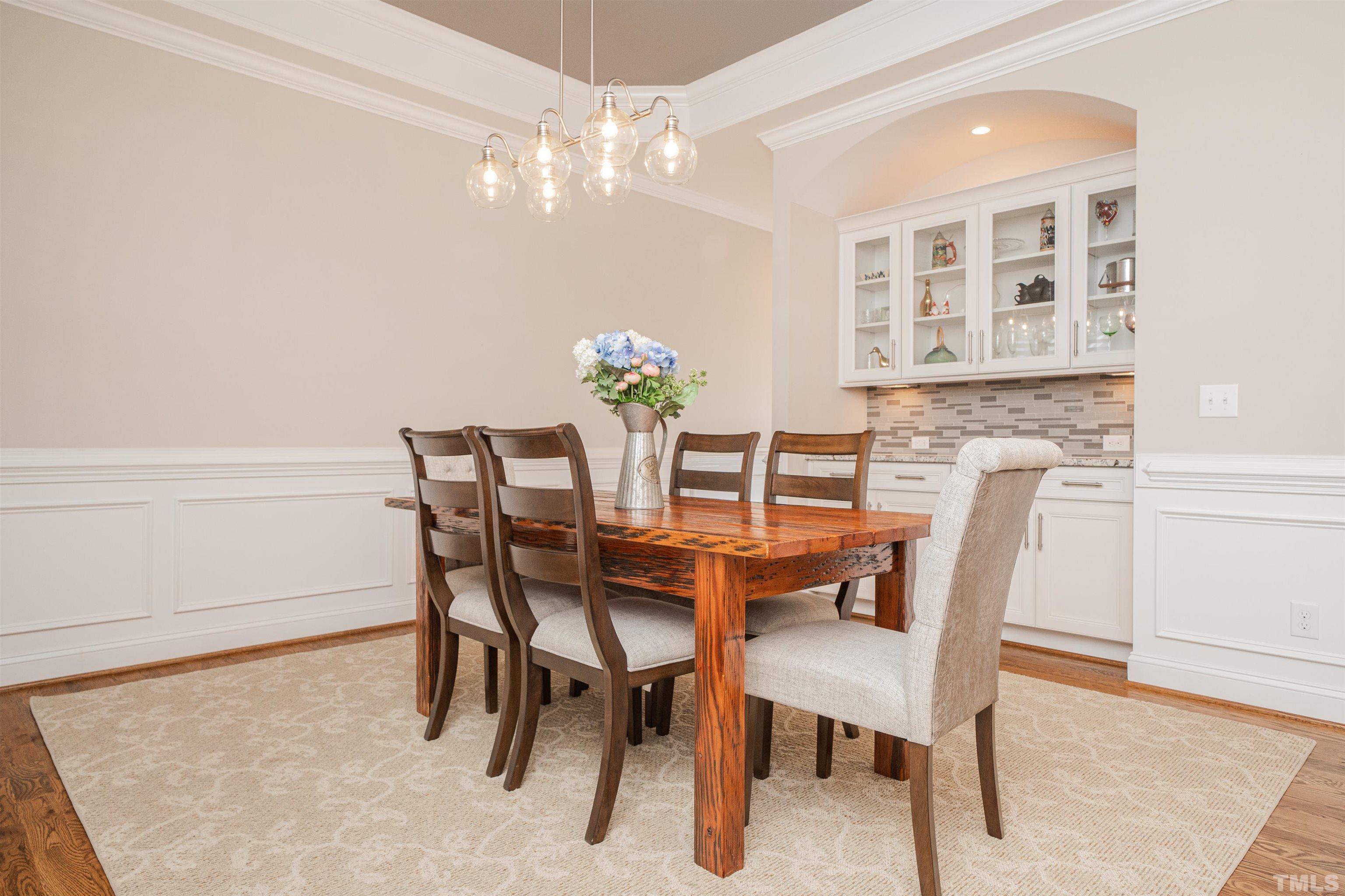 616 Connington Way Rolesville, NC 27571 - Photo 7 of 51 a dining room with furniture and chandelier