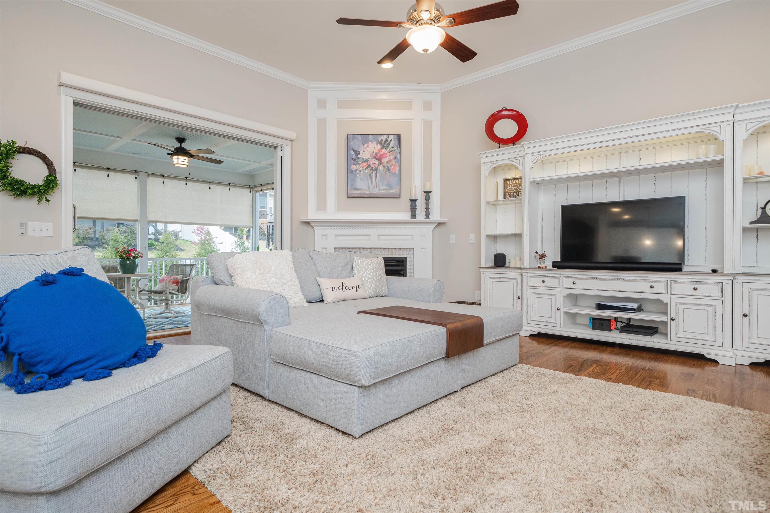 616 Connington Way Rolesville, NC 27571 - Photo 10 of 51 a living room with furniture and a flat screen tv
