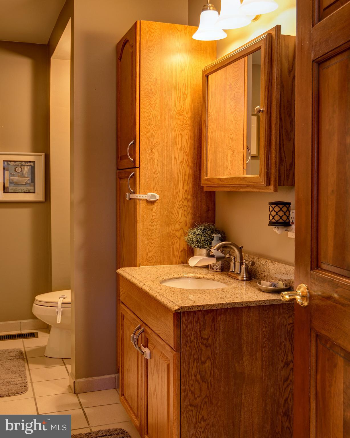 18 Sunset Road Blackwood, NJ 08012 - Photo 15 of 37 a bathroom with a sink a toilet and mirror