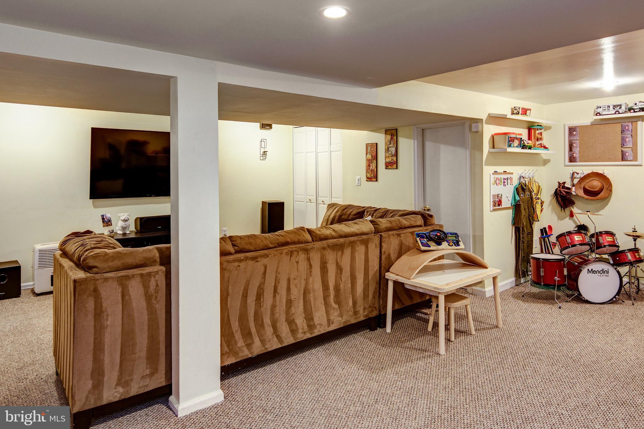 18 Sunset Road Blackwood, NJ 08012 - Photo 17 of 37 a room with furniture a flat screen tv and a window
