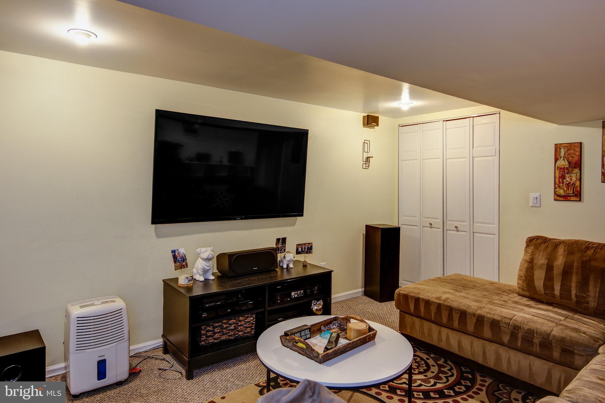 18 Sunset Road Blackwood, NJ 08012 - Photo 18 of 37 a living room with furniture and a flat screen tv