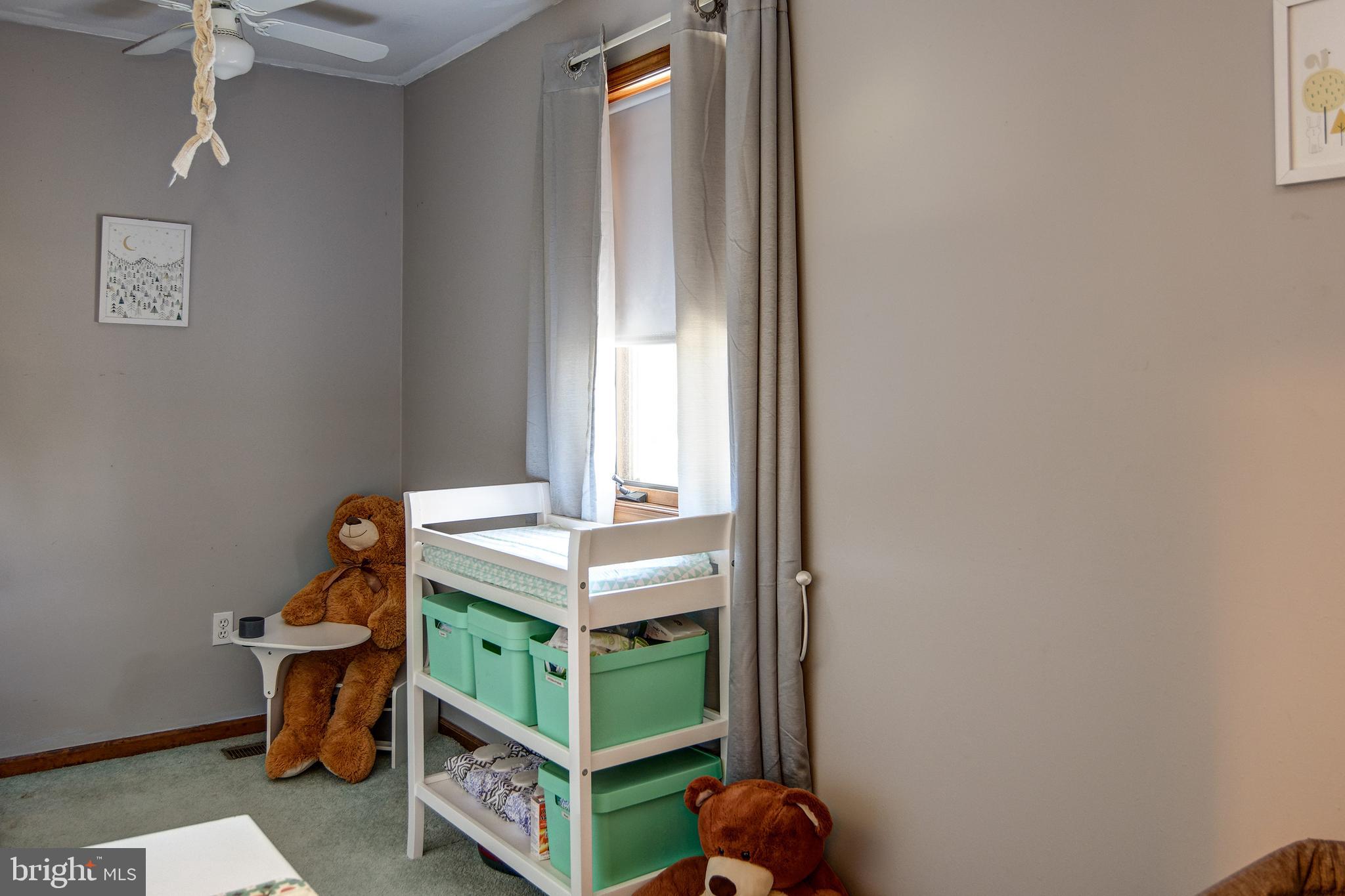 18 Sunset Road Blackwood, NJ 08012 - Photo 30 of 37 a room that has a bed and a table in it