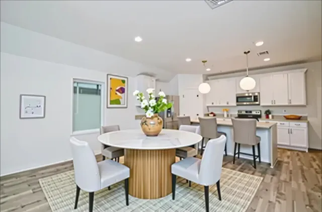 a view of a dining room with furniture