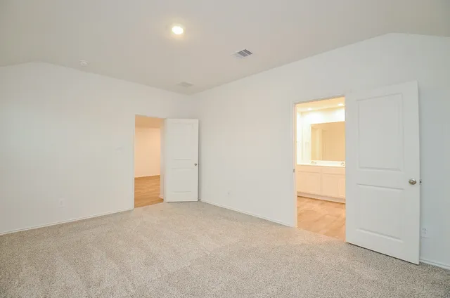 an empty room with a natural light