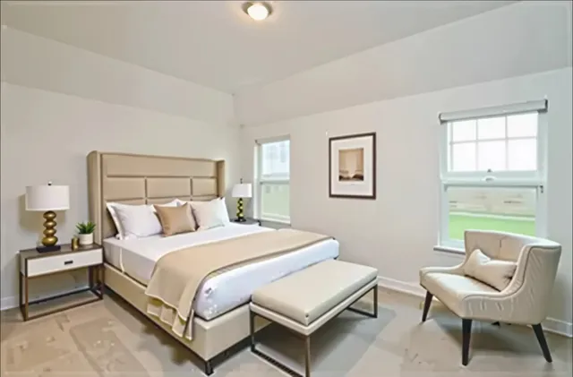 a bedroom with a bed and a window