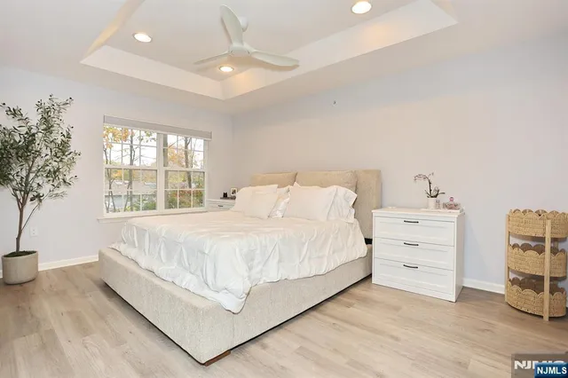 a bed room with a bed and a window