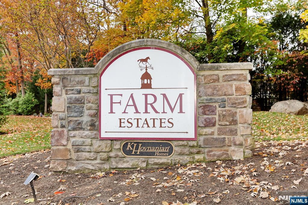 4 Masterson Court, Unit 4 Waldwick, NJ 07463 - Photo 2 of 26 a sign that is on the side of a building