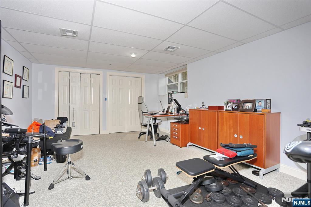 4 Masterson Court, Unit 4 Waldwick, NJ 07463 - Photo 23 of 26 a workspace with furniture and air hockey table