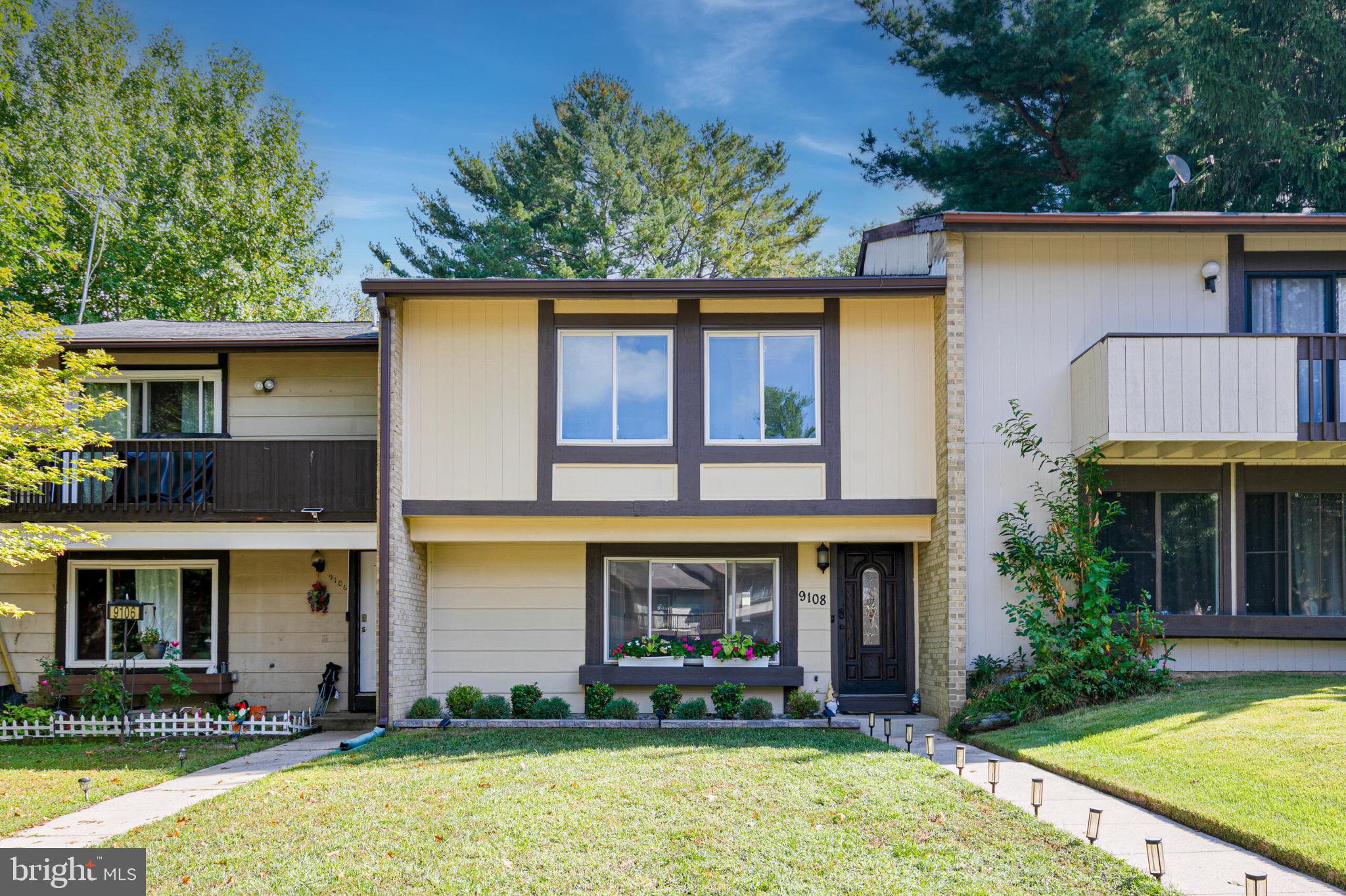 9108 Centerway Road Gaithersburg, MD 20879 - Photo 28 of 33 a front view of a house with garden
