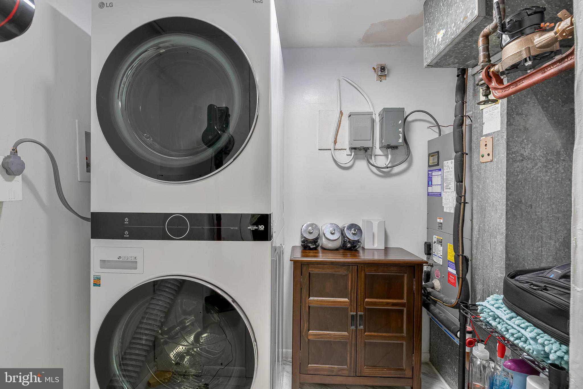 9108 Centerway Road Gaithersburg, MD 20879 - Photo 29 of 33 a utility room with dryer and washer