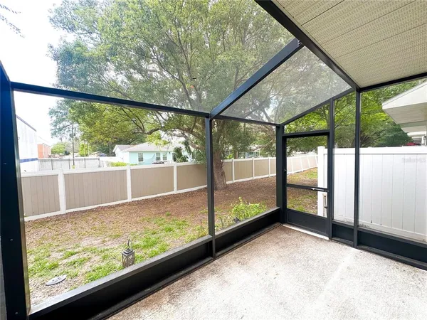 a view of backyard with green space