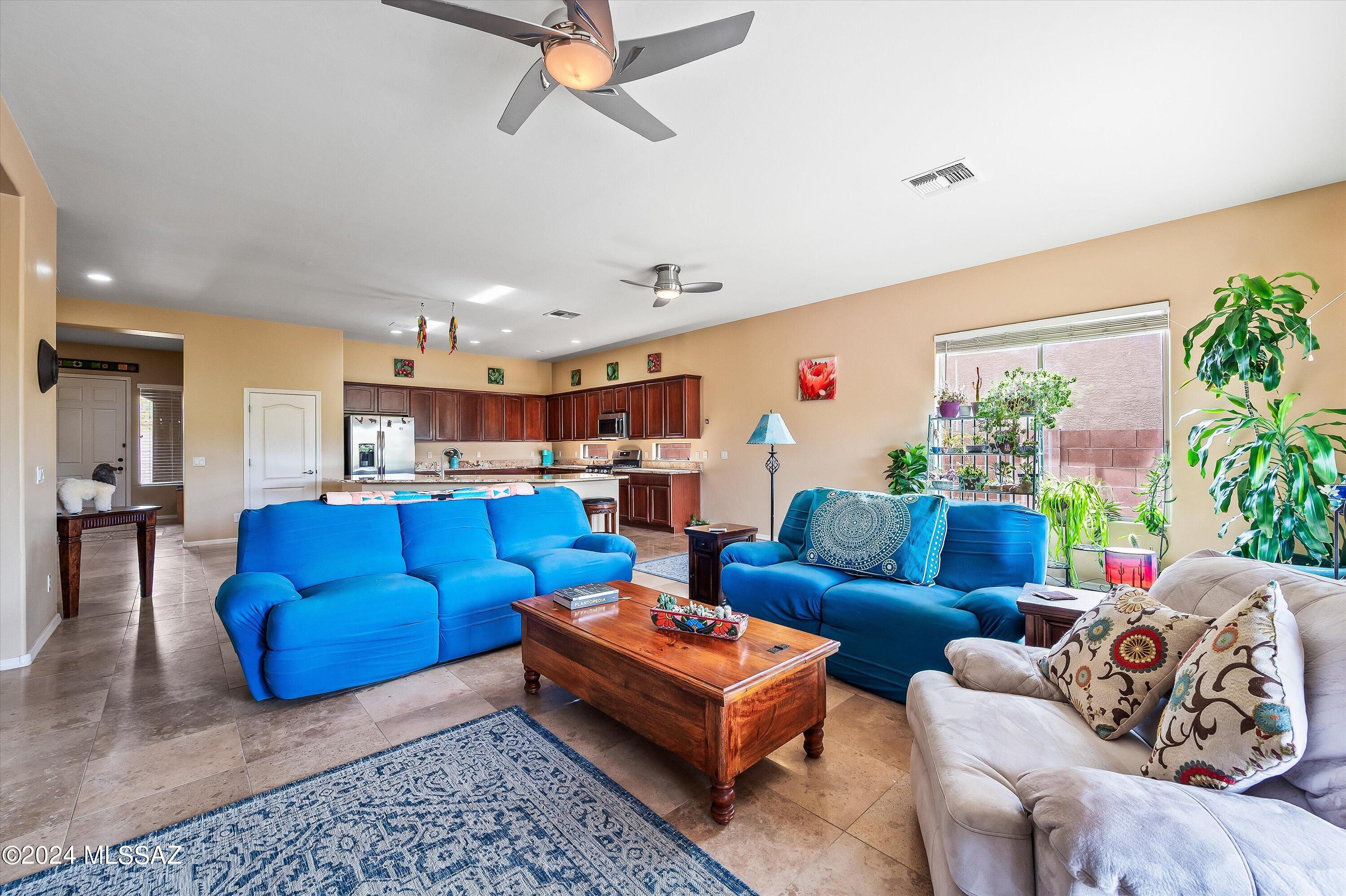 8579 North Shadow Wash Way Tucson, AZ 85743 - Photo 5 of 34 a living room with furniture and kitchen view