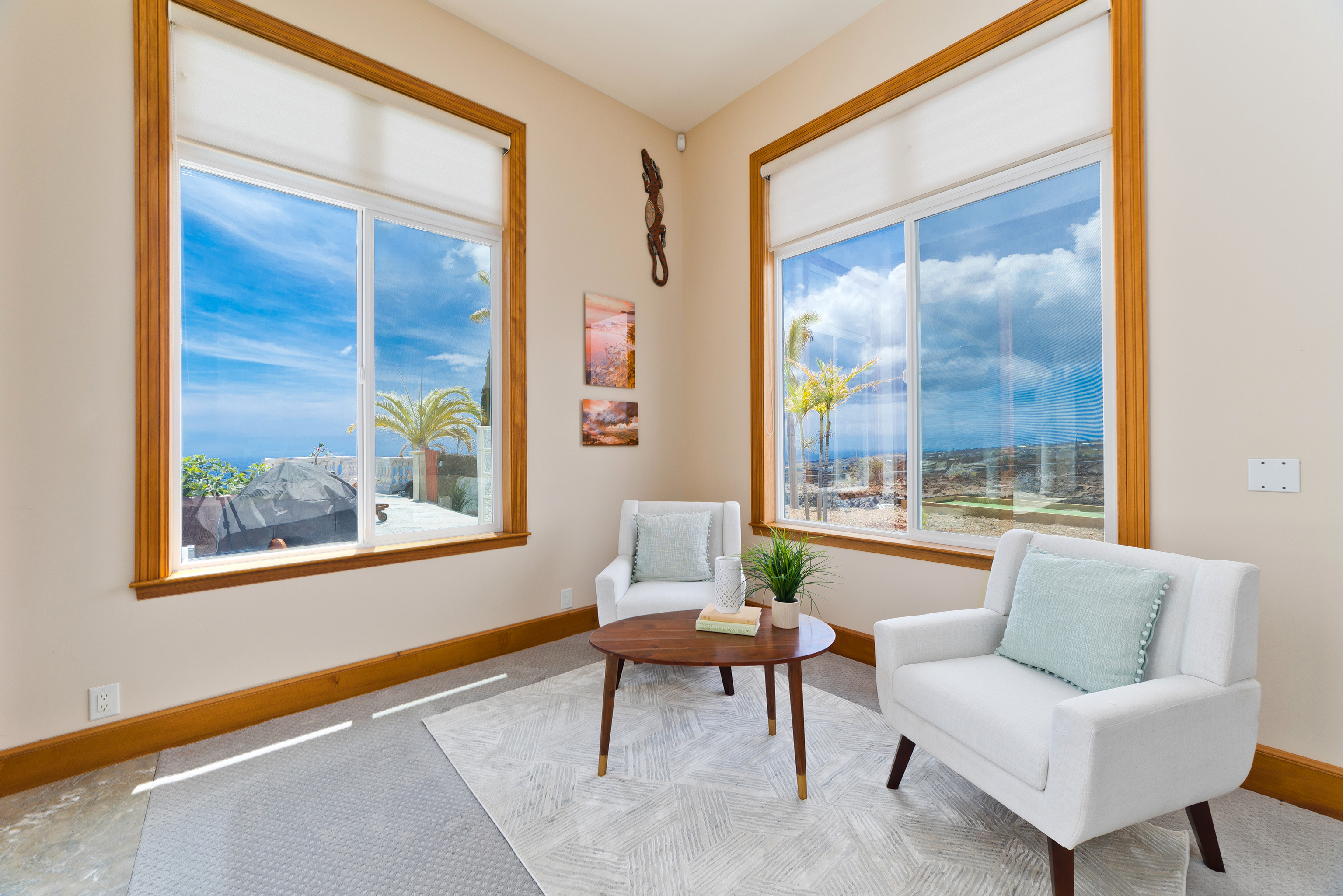92-8322 Jacaranda Drive Ocean View, HI 96704 - Photo 17 of 30 a living room with furniture and a large window
