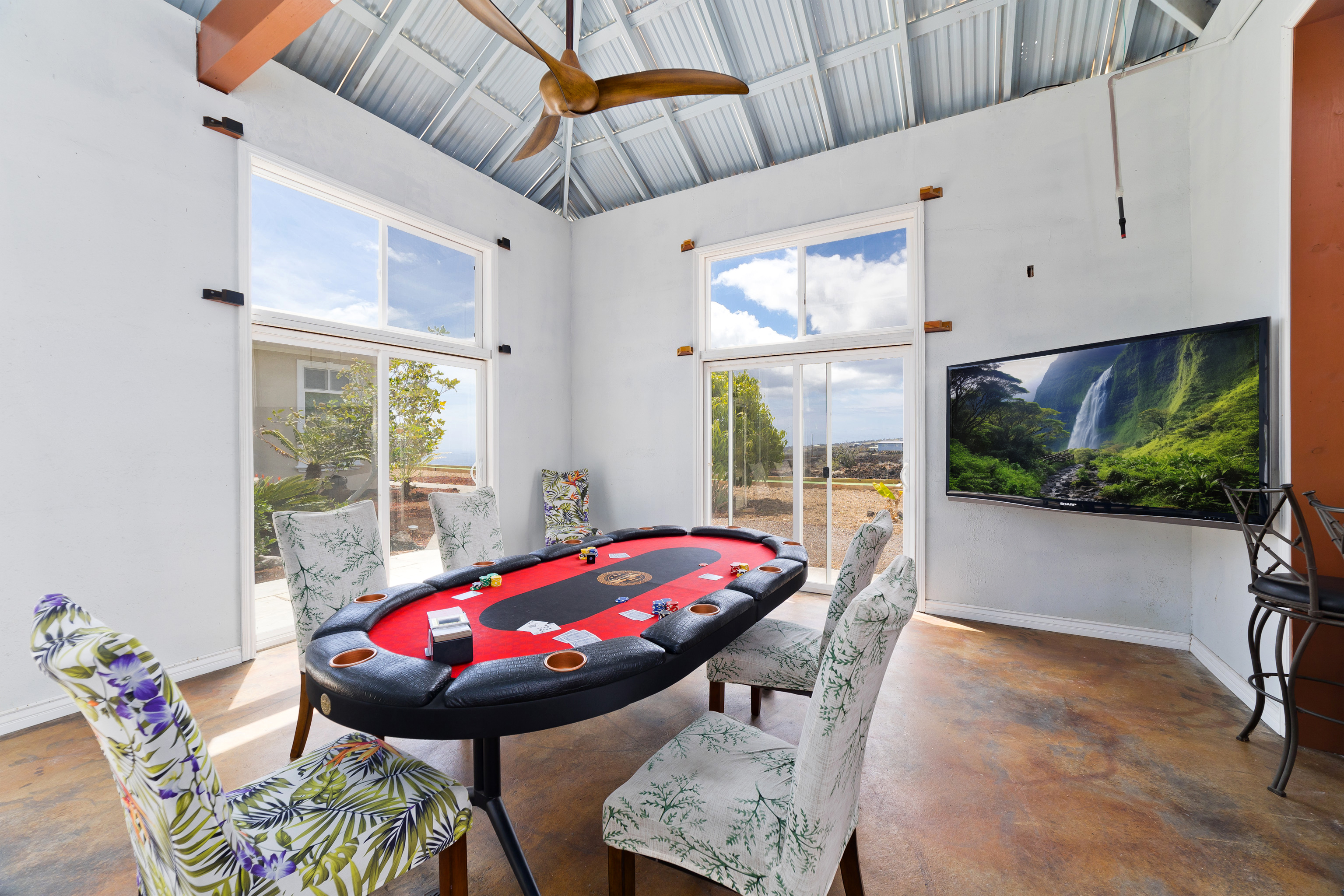 92-8322 Jacaranda Drive Ocean View, HI 96704 - Photo 24 of 30 a view of a dining room with furniture window and outside view