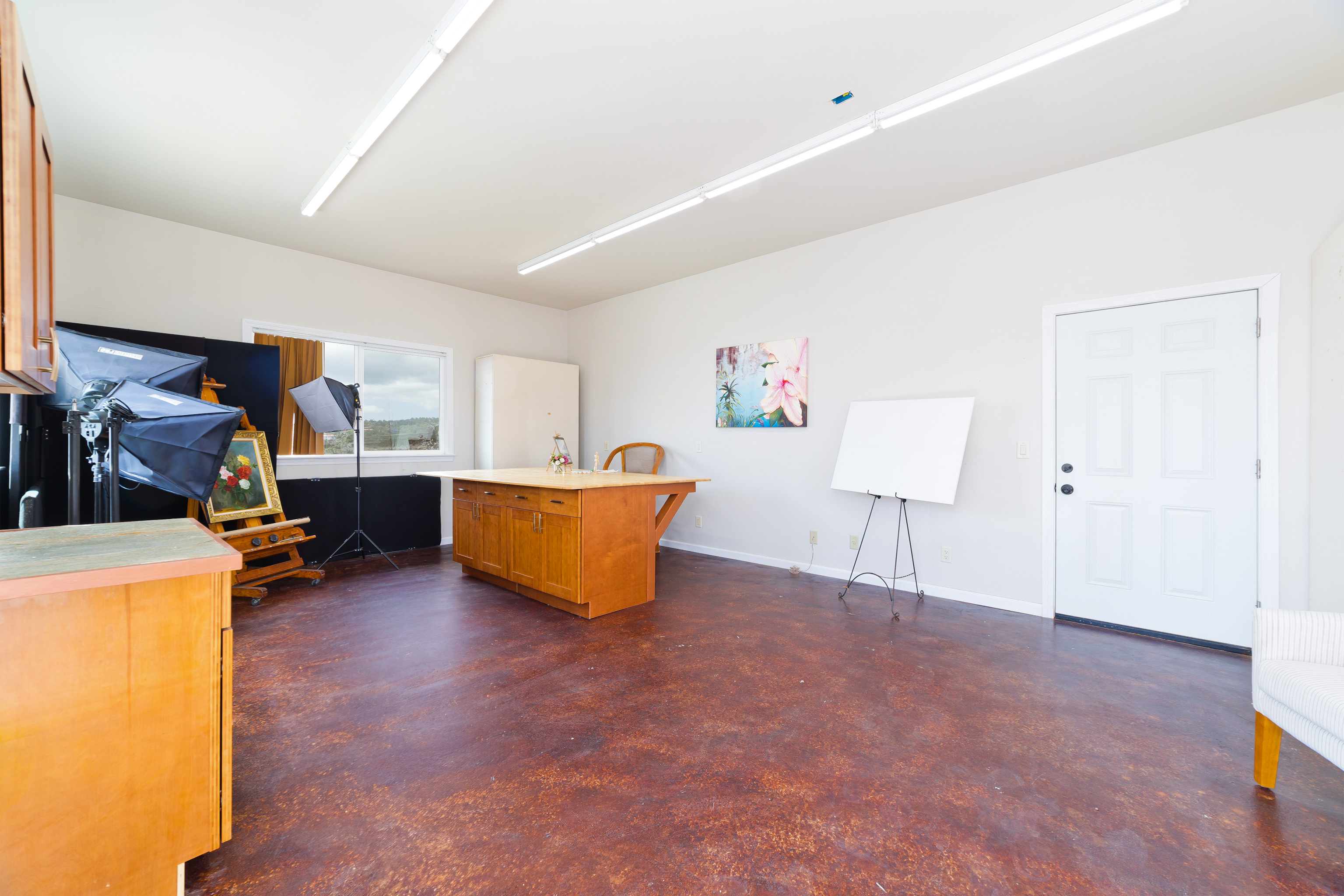92-8322 Jacaranda Drive Ocean View, HI 96704 - Photo 29 of 30 a view of room with furniture and wooden floor